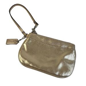Coach gold metallic fabric and leather wristlet hang tag